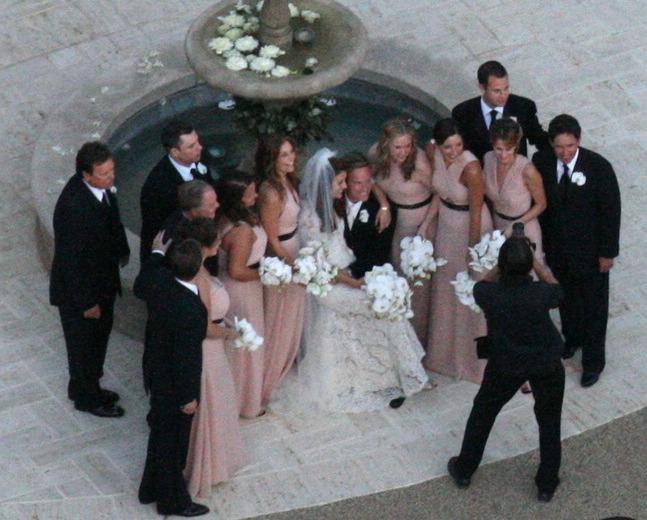 The Wedding Party Flanked by bridesmaids and groomsmen Kate Walsh and Alex 
